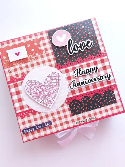 I love adding unique touches, like this beautiful string art heart on the cover of an anniversary scrapbook. It comes in a matching gift box, making it a complete and ready-to-give present.