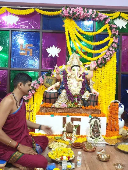 A priest performing the puja during our Ganesh Chaturthi celebration, an important cultural event at Sangeet Gurugriha.