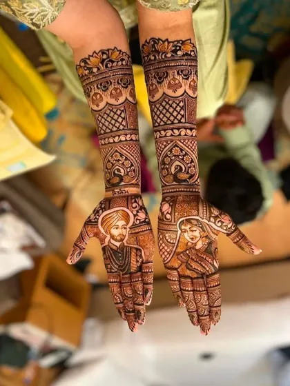 A beautiful example of a Punjabi bride and groom portrait, capturing the details of the Sikh groom's turban and the bride's jewelry.