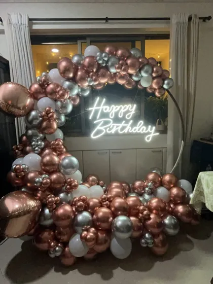 The elegant at-home birthday setup, perfect for creating a special photo corner in any living space.