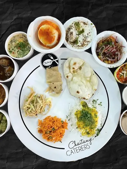 A beautifully composed plate showcasing the variety of a single meal at one of my events. It's a feast that brings together flavors from across India.