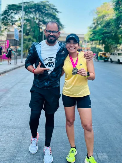 A duplicate of image 51. Post-race celebration with a friend and pacer who helped me achieve my personal best at the TCS10K.