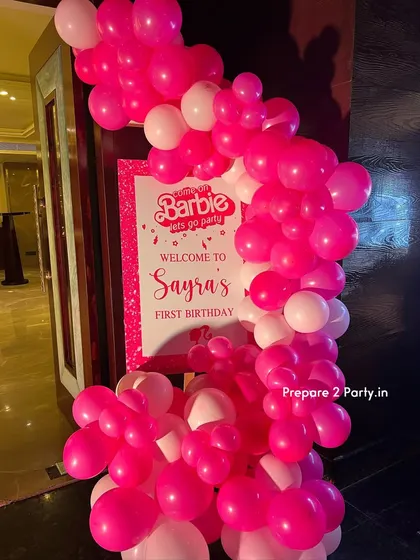 See more of my Barbie themed decorations, showcasing elements like custom welcome signs, life-size photo booths, and elegant table centerpieces that bring the iconic doll's world to life.