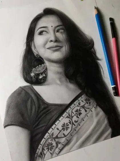 The finished portrait for a client from Delhi NCR. The traditional saree and large jhumka earrings create a stunning and classic look.