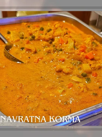 Our rich and creamy Navratna Korma, a vegetarian main course made with a medley of vegetables and nuts in a mild, flavorful gravy.