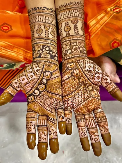 The front of my mother's hands, with a beautiful, intricate design.