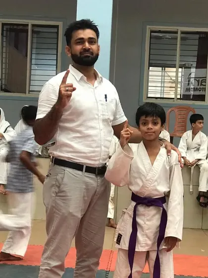 Another proud moment with one of our purple belt students, celebrating his selection for the district level school karate sports. His hard work in class is evident.