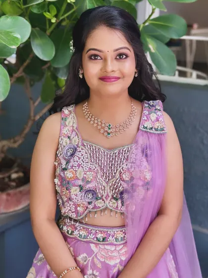 A full portrait of Charitha looking radiant and beautiful for her engagement ceremony.