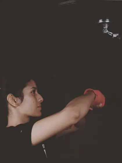 Training here builds more than just physical strength; it builds mental fortitude. This is the focused, determined look of a woman who is pushing her boundaries and discovering her own power.