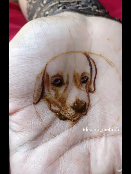 A close-up of the pet portrait of Bruno, drawn with my natural henna. Capturing the gentle expression of a beloved pet is a special challenge that I find incredibly rewarding.