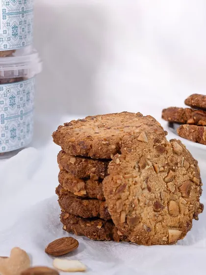 Our Crunchy Nut Cookies are the perfect companion for a cup of tea or coffee. They are loaded with almonds and other nuts, giving them a satisfyingly crunchy texture.