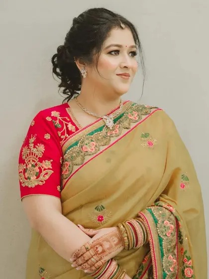 The final portrait of a happy and elegant client, ready for her special event.