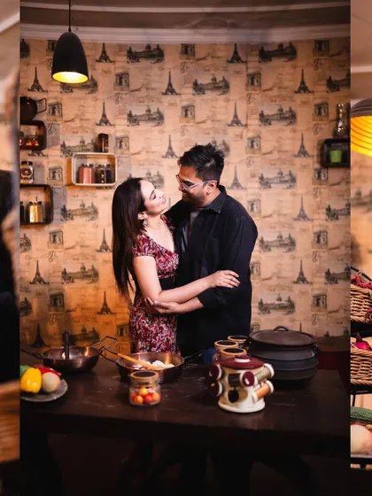 A wider view of their cooking-themed pre-wedding setup. This shot captures the cozy and romantic atmosphere we created for their unique love story.