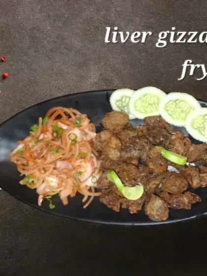 A popular starter, our deep-fried liver and gizzard. It's crispy on the outside, tender on the inside, and served with a fresh onion salad.