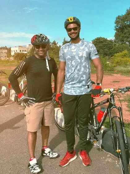 Another shot celebrating a successful 50km ride with a client, marking a significant achievement in his cycling journey.