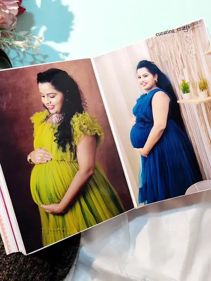 An inside spread of the maternity album, showcasing stunning professional photos.