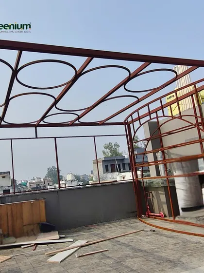 A look at the MS fabrication work for a terrace project in Paschim Vihar. This image shows the custom-designed pergola frame being constructed on-site, ready for finishing.