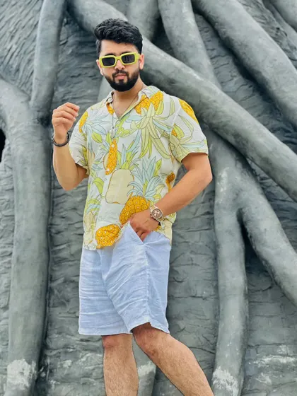 A fun, tropical-themed outfit perfect for a beach party or a summer Mehendi. The bright colors and fun pattern match my energetic style.
