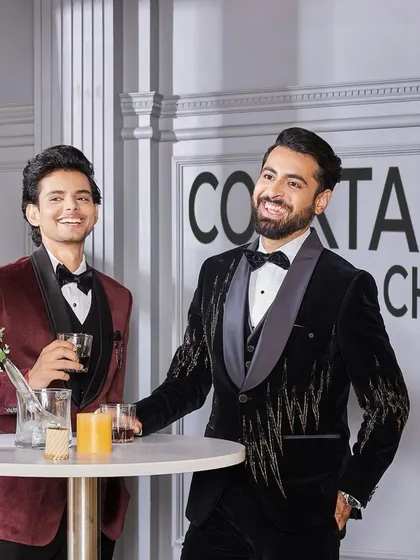 This is the energy of a celebration. Dressed in our finest velvet tuxedos, these gentlemen are ready for a night of camaraderie and style. It is more than an outfit; it is about creating merry moments.