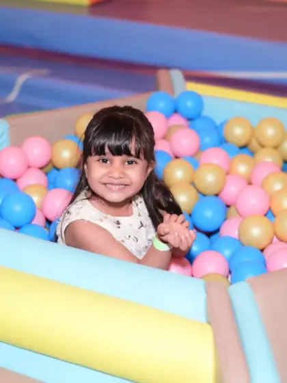 A big smile from our ball pit. We ensure our play areas are clean and well-maintained for your peace of mind.