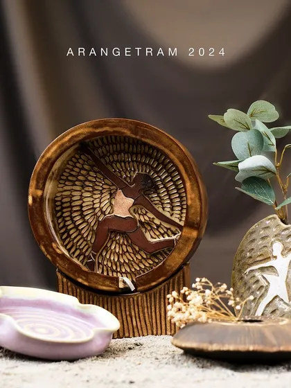 Hazel, a graphic designer and potter, presents her collection "Fragile but strong" at Arangetram. Inspired by ballet dancers, her hand-built pieces explore the dual nature of life and clay, where external grace meets inner resilience.