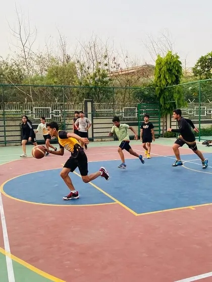 A fast break in action, with a player leading the charge down the court.