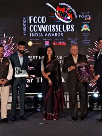 Our team proudly accepting the 'Best Nightclub of the Year' award on stage. This recognition is a result of their incredible dedication and passion.