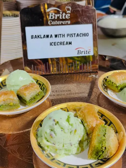 A classic combination of flaky Baklava served with a scoop of rich Pistachio Ice Cream.