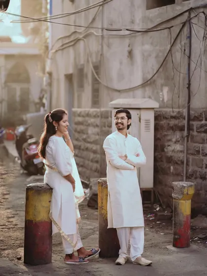 A relaxed, candid shot in a city alley. It shows that beautiful photos can be taken anywhere, as long as the connection is there.