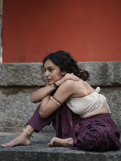 A contemplative pose that reflects both vulnerability and strength. My journey is about embracing all aspects of my being and soaring in my feminine energy.