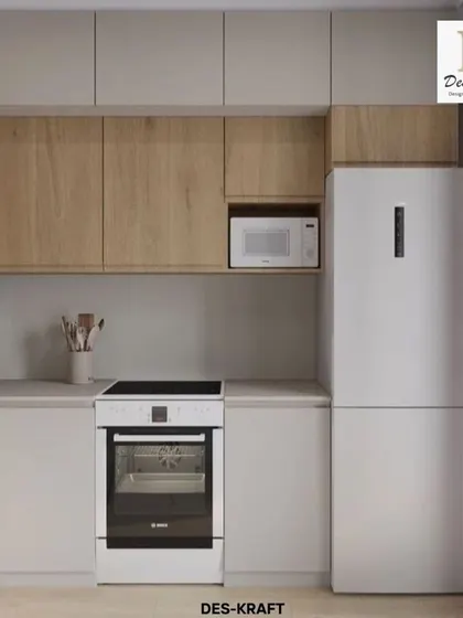 A close-up of the integrated refrigerator and microwave, demonstrating how we maximize functionality even in smaller kitchen designs.