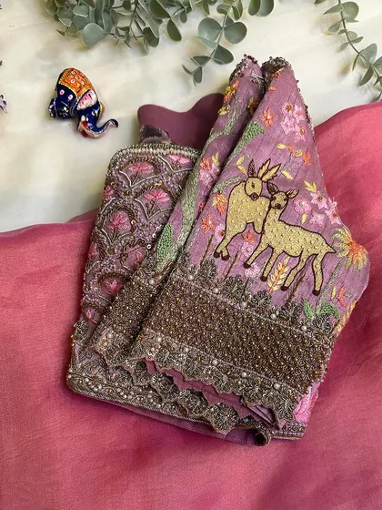 The sleeve detail of the Janaki Rama blouse, featuring the gentle deer motif, a subtle echo of everlasting love.