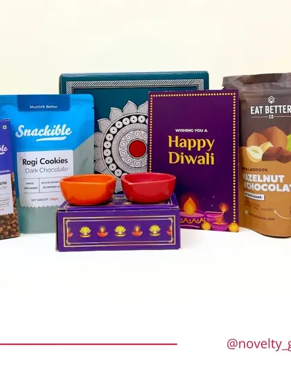 A budget-friendly Diwali hamper option starting from Rs.399. This set includes ragi cookies, hazelnut chocolate, and decorative bowls, offering great value.