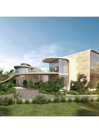 Another view of the Cipla Museum, showcasing its sculptural form nestled within a lush green landscape. This project is a testament to how architecture can create powerful, experiential civic spaces.
