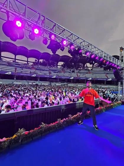 A wide shot from the stage at Kanteerava Stadium. The feeling of leading thousands of people in a unified movement is indescribable.
