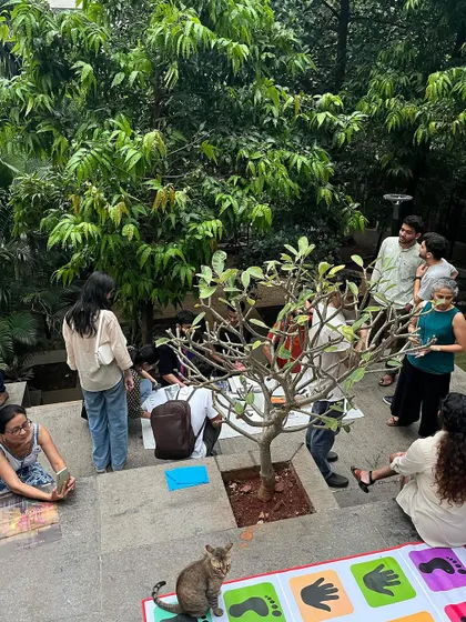 Community members enjoying the different levels and nooks at the Nepean Greens open house. The design encourages informal social interaction and creative use of the space.