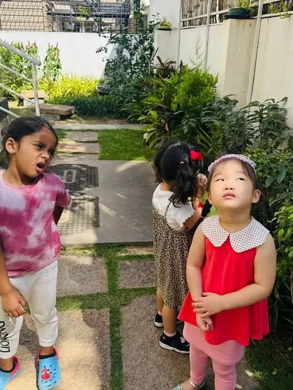 The children's expressions of curiosity and wonder are priceless. Asking questions and making observations are the first steps of the scientific method.