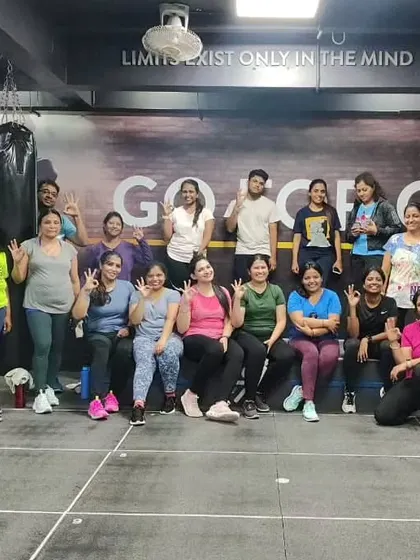 The heart and soul of my classes. Each photo captures a unique moment with my incredible community after a sweaty, joyful session. This is our shared victory lap.