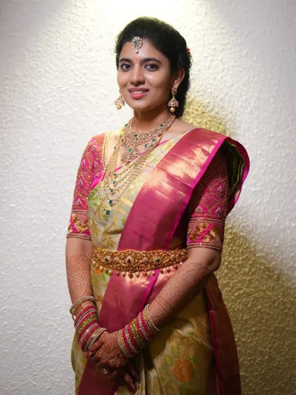 Exquisite allure in a bespoke creation. My client stuns in her custom designer blouse, epitomizing sheer beauty and grace on her memorable engagement day.