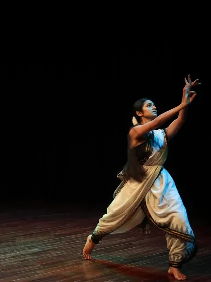 A powerful stance from a Bharatanatyam performance, highlighting the strength and beauty of the form.