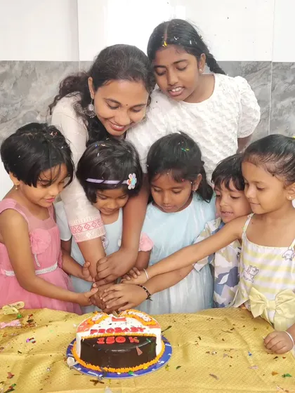 A celebration is not complete without a cake. Sharing this happy moment with the children who inspire so much of my work.
