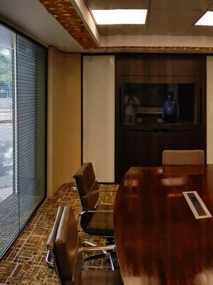 A view from inside the fully equipped smart pod. The system can be programmed to adjust lighting and temperature based on user preferences or meeting type, all managed automatically.