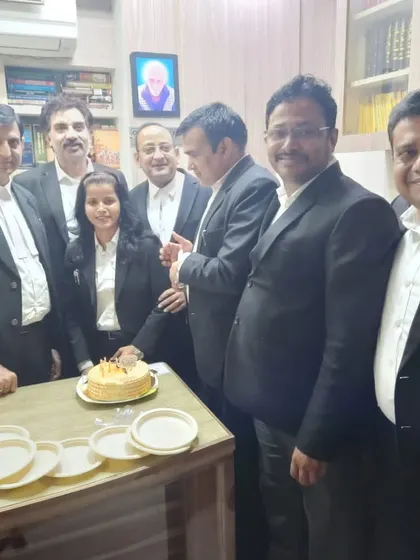 The team celebrating together. Success in criminal law practice is often a collective effort.