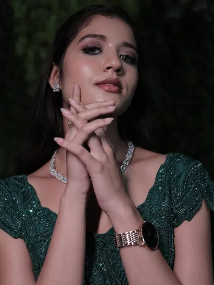 A flawless makeup base is key for any special occasion. This look features a subtle glam eye and a perfectly blended base, ensuring she looks stunning all night long.