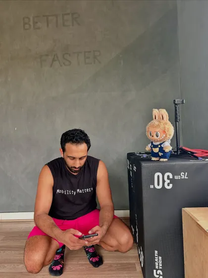 My friend here is making sure I'm responding to all my client messages. Or maybe he's just judging my form.
