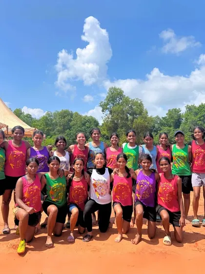 A group photo of our girls' ultimate frisbee team at the Auroville Hat Tournament. These events provide invaluable experience and help players grow in a supportive, fun environment.
