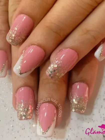 Pretty in pink and sparkle. This design combines a lovely shade of pink with a chunky silver glitter, used both as a French tip and in a V-shape design for a fun and glamorous look.