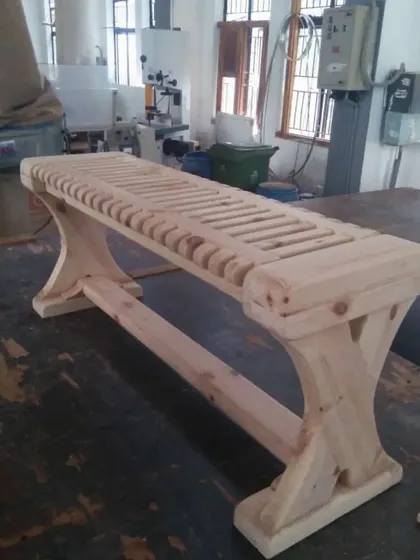 The fully assembled bench, fresh from the clamps and before the final sanding and finishing. The raw construction showcases the accuracy of the joinery and the success of the assembly process.