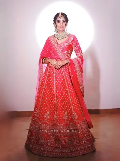 A final full-length view of the stunning bright pink lehenga.