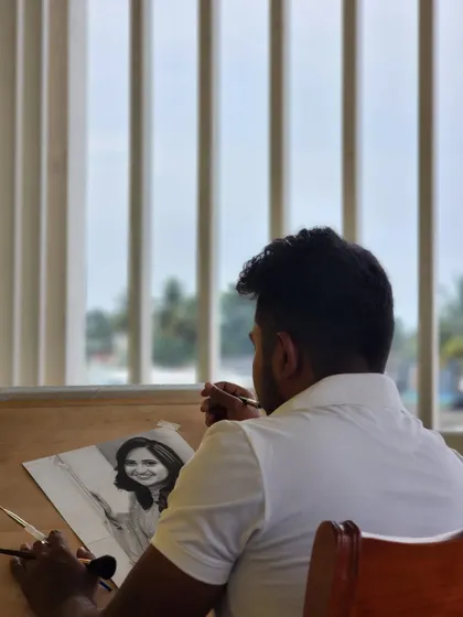 Me working on a portrait in my studio.